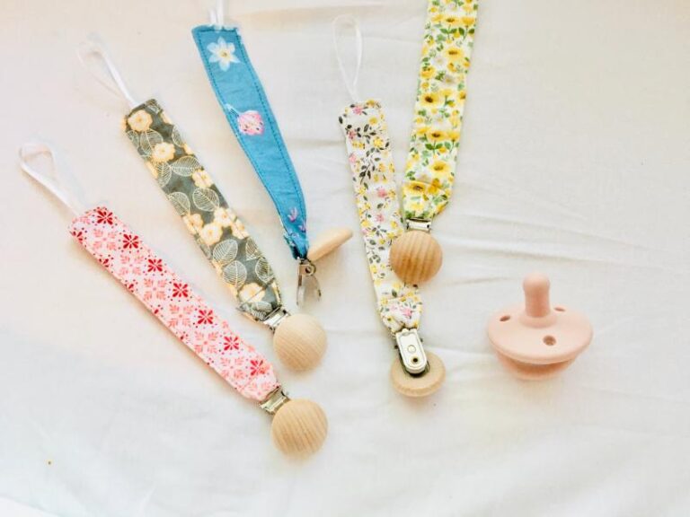 Pacifier-clip-holder